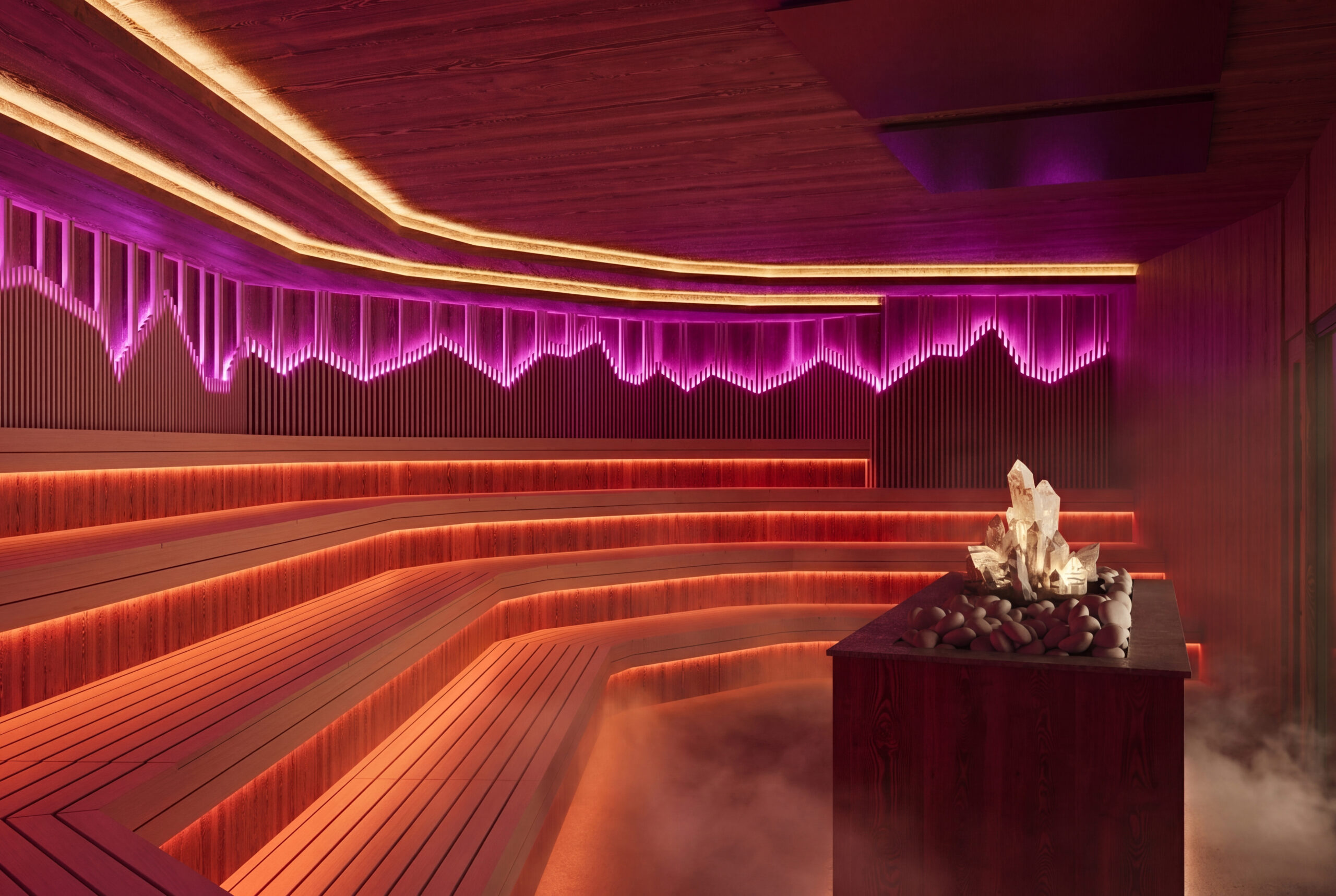 Moderne Eventsauna im Palm Beach mit mehrstufigen Sitzbänken, Kristall-Aufgussstein und eindrucksvoller LED-Beleuchtung in warmen Rot- und Violetttönen.